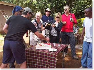 The girls enjoying cake with all the climbers