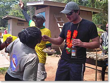 Robert feeding one of the ladies cake