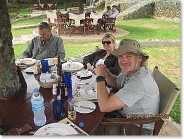 Bill, Mairin, Bob enjoying lunch out by the pool