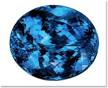 A Tanzanita tem aspecto similar a turmalina brasileira, que pode ser encontrada em diversas cores, dependendo da concentração de aluminio, ferro, magnesio, sódio, lítio ou potassio. Aqui é a Turmalina Paraíba (The Tanzanite has some similar aspects of the Brazilian Tourmaline, which can be found in a big variety of colors, depending on the concentration of aluminum, iron, magnesium, sodium, lithium, or potassium. Here is the Brazilian Paraíba Tourmaline.)