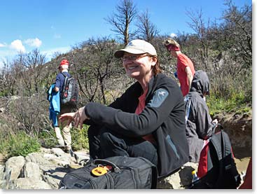 Mary Ellen taking a break on the trail