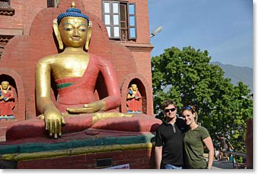 Daniel and Cassidy by a Buddha at Swayambunath