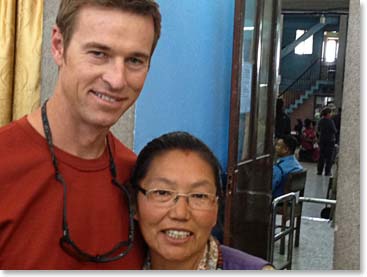 Todd has been eager to see his dear friend Ang Tashi Sherpa who lives in Kangzuma, on the trail to EBC. By happy coincidence, Tashi was in the departure lounge waiting to fly home today. We will see her again soon when we visit her and her husband Lakpa Dorjee at their lodge