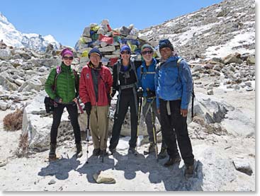 When climbing Kala Patar one finds chortens with prayer flags far below the top. The views are spectacular the whole way up.