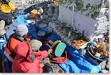 Our climbing Sherpas assisted the lama with preparing his supplies at the chorten