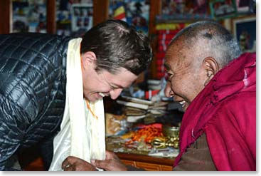Daniel and Geshe both crack up as he is being blessed.
