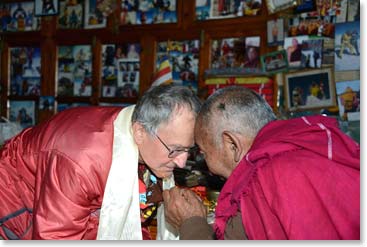 A medical doctor from Canada receives a blessing from a doctor of Tibetan learning.