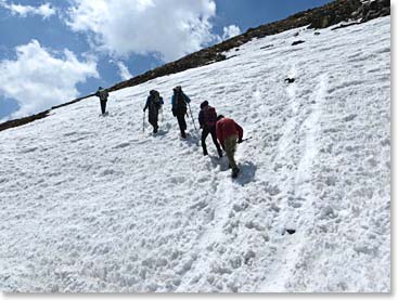 As they climbed higher they encountered snow.