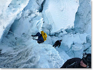 Daniel climbing in the Icefall with Todd watching