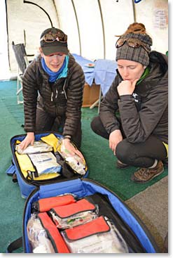 Dr. Suzi Mackenzie and Dr. Katie Ross check our medical response pack at the Base Camp ER clinic