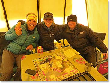 Simone Moro, Italian climber and Helicopter Rescue Pilot, Dr. Suzi Mackenzie from Scotland and Daniel ready to play Monopoly, Mountaineering Edition.