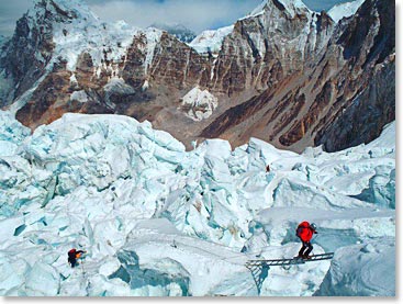 Using ladders to cross a crevasse at Everest's Khumbu Icefall, not far above Base Camp
