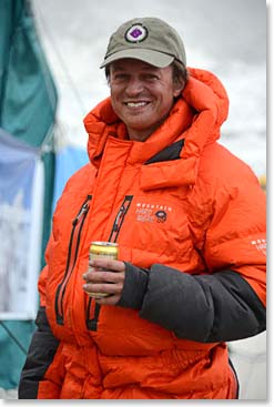 Daniel enjoys his first beer at Base Camp. He is thinking that if he sews a beer cozy onto the chest of his Onesie, he might be able to wear it on hunting trips back home in Tennessee. 
