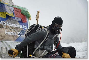 We had been concerned about frostbite on Todd’s feet and face, so he descended all the way to Base on oxygen.  His Alice Cooper signed Fender, which he had carried all the way to the summit was still in his pack.