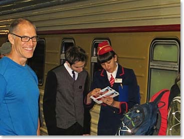 Gordon has his documents checked just before he climbs on board 'The Red Arrow Express'