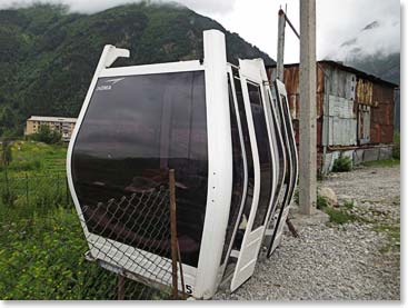 This area is hard to describe! Extremely poor and people lead simple and hard lives, but someone got a brand new Poma cover ski lift car to use for a shop.