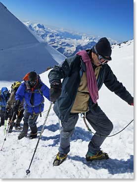 Vladimir Bakhmutov leading the group toward the West Summit of Elbrus, the highest point
