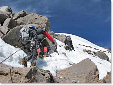 Climbing through rocks and snow to reach the Glacier Lagoon 16,535ft /5,040m