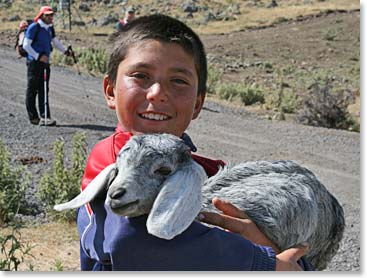 A local kid showing us his pet