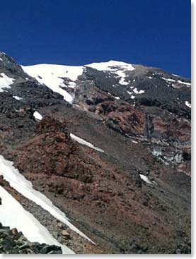 Looking up towards the summit today. The very top is out of our view at 5,137 meters above sea level. We will have a 1,000 meter ascent tomorrow morning.