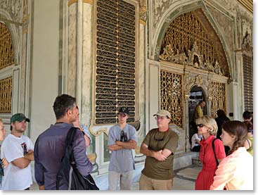 The group listening to our guide at the entrance of the Topkapi Palace