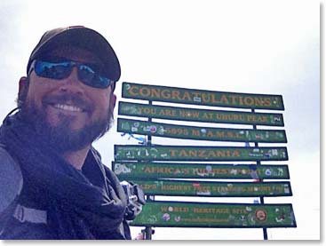 Jason looking proud to be on top of Kilimanjaro