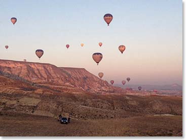 One of the perks of being the first balloons out in the morning is flying through beautiful pink skies.