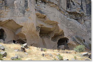 There were dwellings in the rock everywhere.