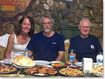 Carolyn, Dennis and Doc enjoy quite a feast at our farewell dinner.