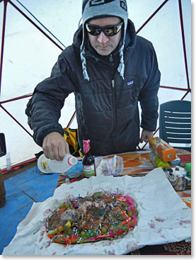 Preparing a gift for the Pachamama; the goddess worshiped by the indigenous people of the Andes as “Mother Earth”.