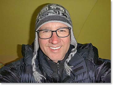 Alain with a big smile, in his tent at High Camp