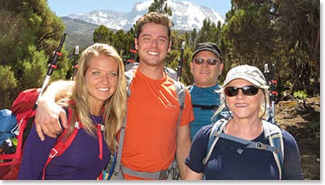 The Sutterlin’s beginning their hike in the forest with beautiful views of Kilimanjaro in the background