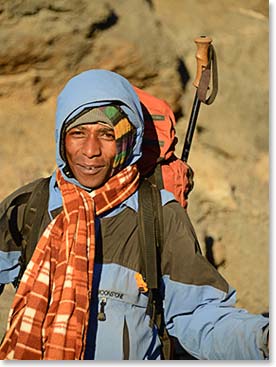 Berg Adventures porter Alpha accompanied the team all the way to the summit,
