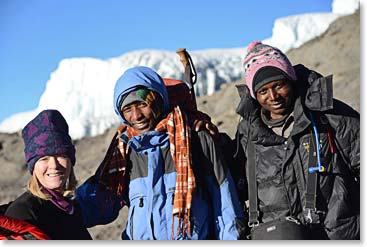Colleen, Alpha and Erick near the Crater Rim, with the glacier behind