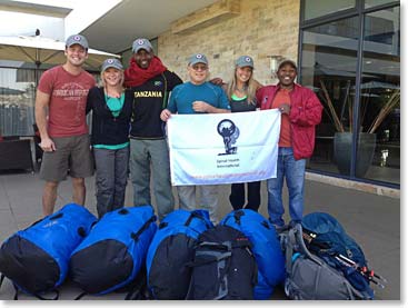 It is hard to believe that we did this in only 5 days. Here is an excited – and cleaner – team with Emmanuel and Arnold after we’d packed our bags at the hotel back in Arusha.
