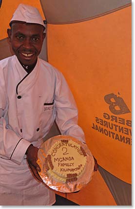 The first indication that the climbing was over and the party had begun was when our chef, Yona, presented us with a congratulatory cake, which he had baked in a tent at 10,000 feet above sea level.