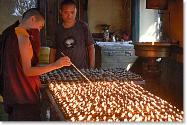 Hundreds of butter lamps are lit inside a monastery at Swayambhu. 