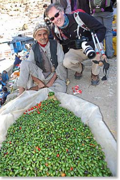 Scot checks out the wares of a chili merchant.