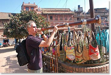 Scot enjoying one of the many items found for sale in Kathmandu