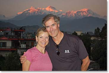 Keely and Scot at sunset with the Annapurna range behind