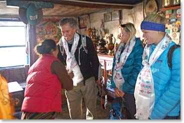 A familiar farewell, Khata blessing scarves are offered to travellers in Mustang just as they are in the Sherpas homes near Everest.