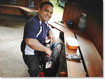 Bharath packing his day pack for his first day on the mountain