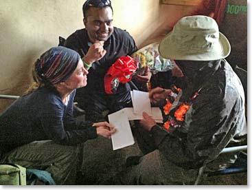 Bharath and Sheila organizing the tips to be handed out in a ceremony for all of the amazing guides and staff.