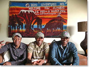 Berg Adventures guides Sprian, Emmanuel and Brian welcome the team “Kilibabes Plus One” to Arusha.