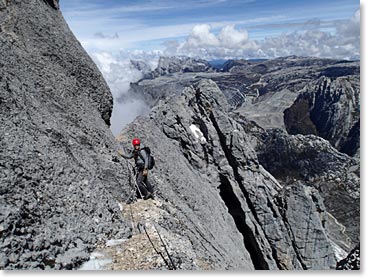 Urszula climbing to the summit of Carstensz Pyramid