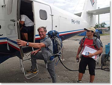 Don boarding the plane to Timika