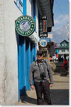 Ryan stands outside of the Starbucks in Lukla