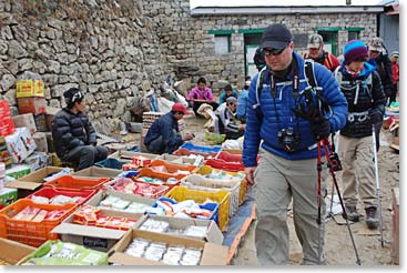 Ryan checking out the items in the local market