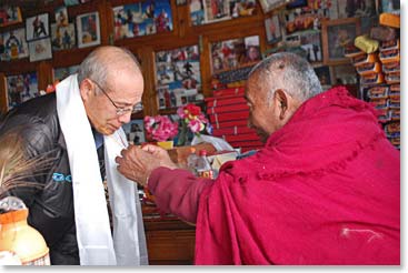 Dave Cohn being blessed by the revered Lama