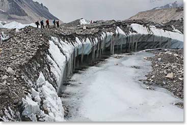 The team heads to Everest Base Camp over the stark glacial moraine.